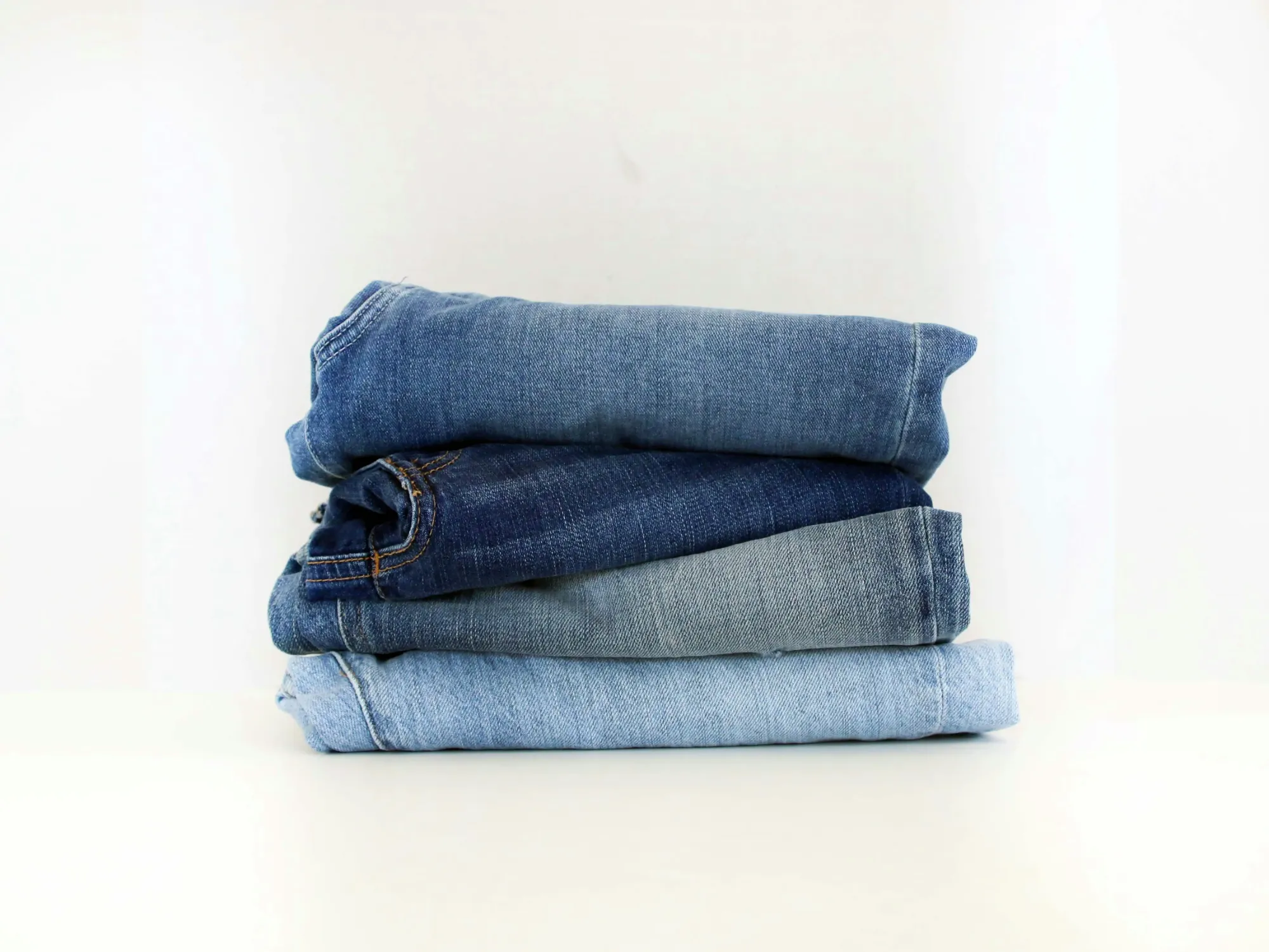 Enzyme-washed jeans on the drying rails